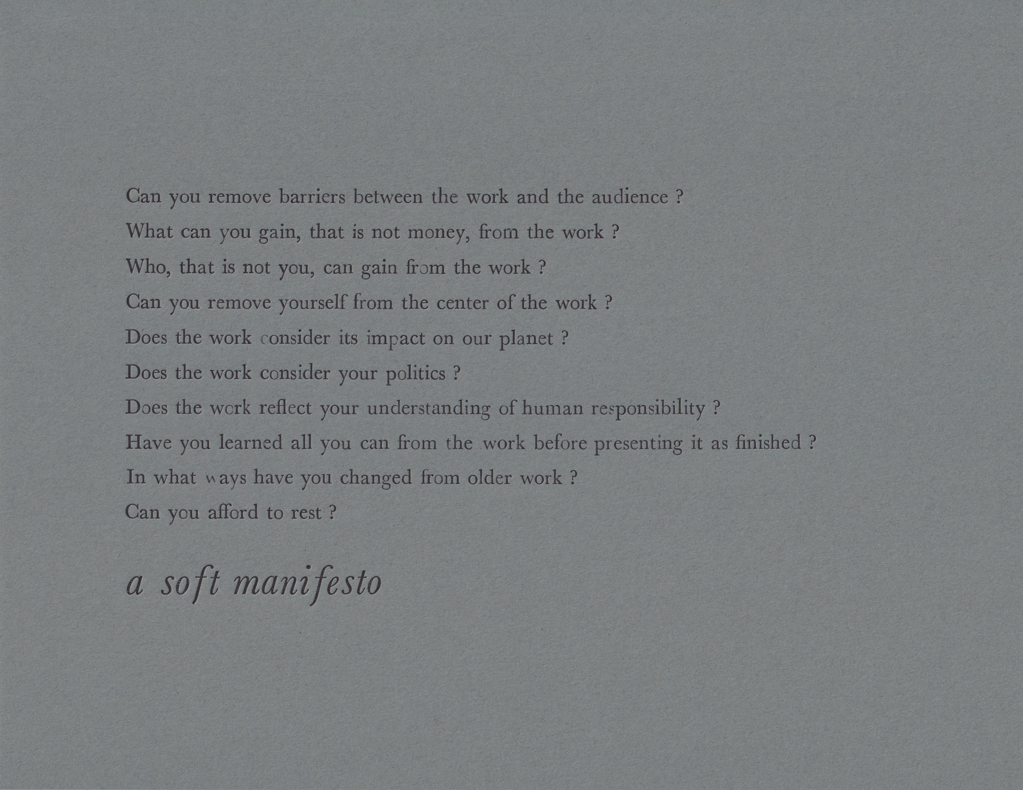 manifesto text letterpress printed with black ink on dark paper